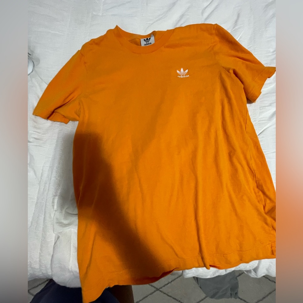Neon orange adidas shirt